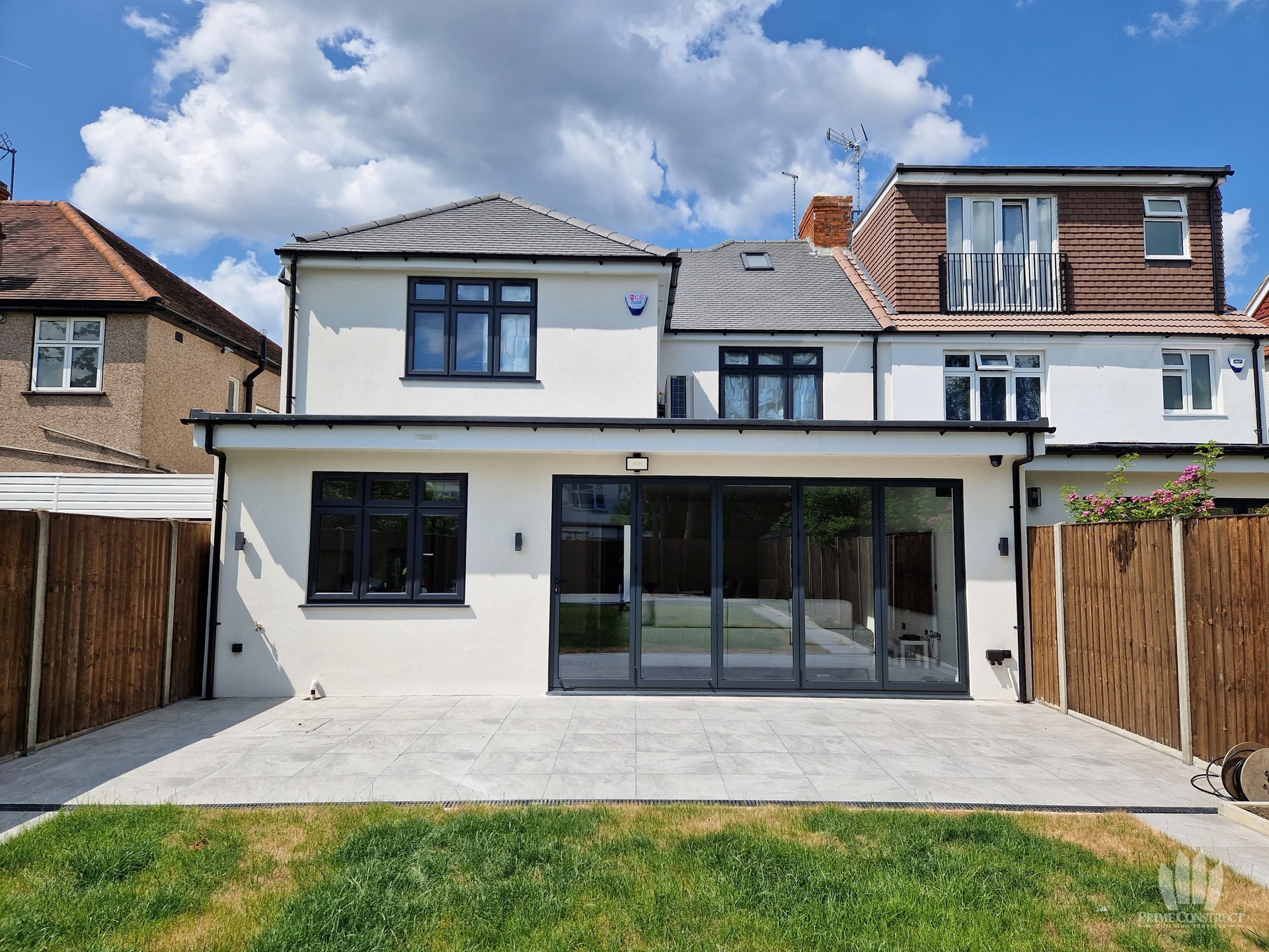 Completed rear elevation, glazing and patio