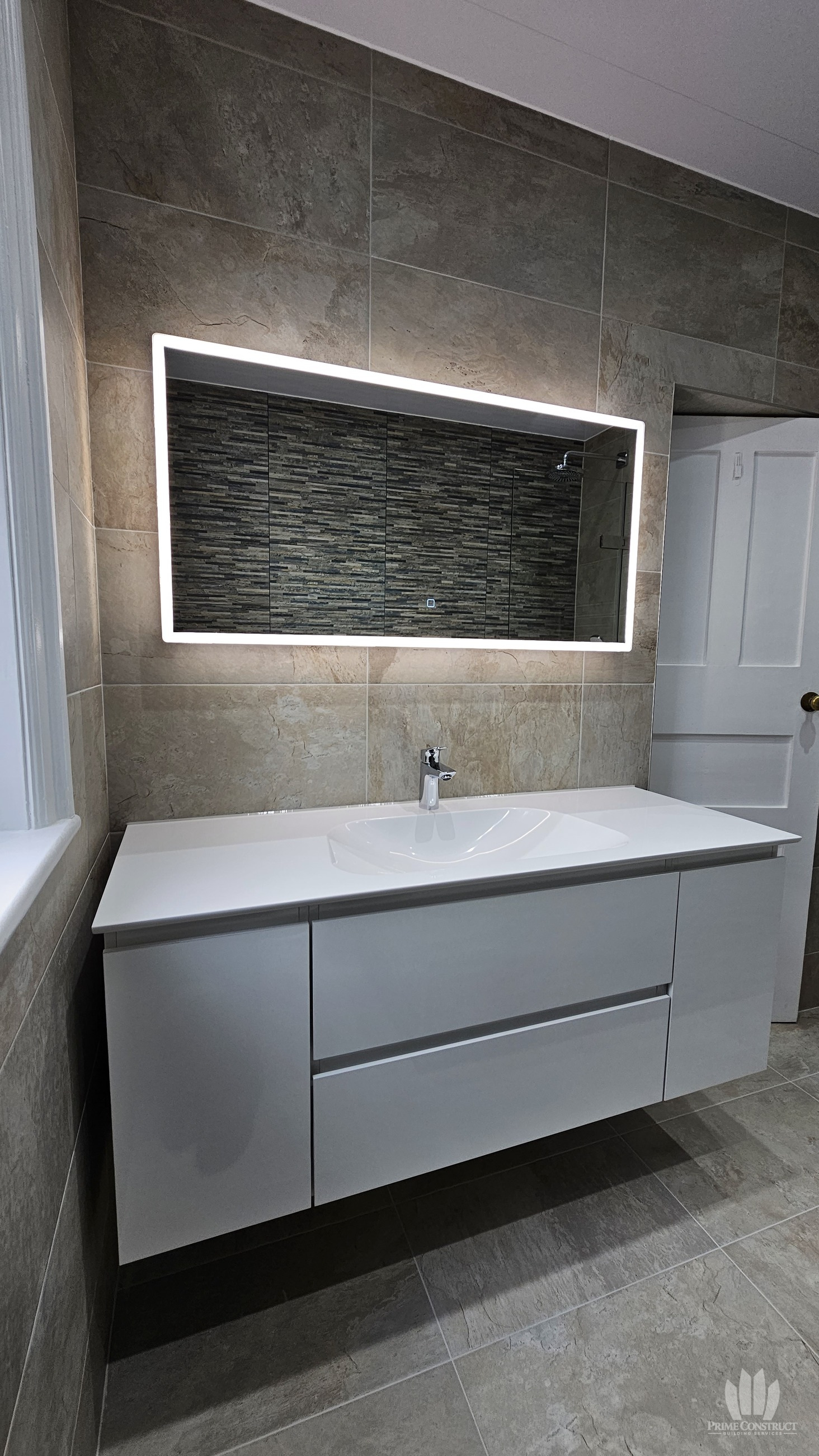 Vanity and illuminated mirror