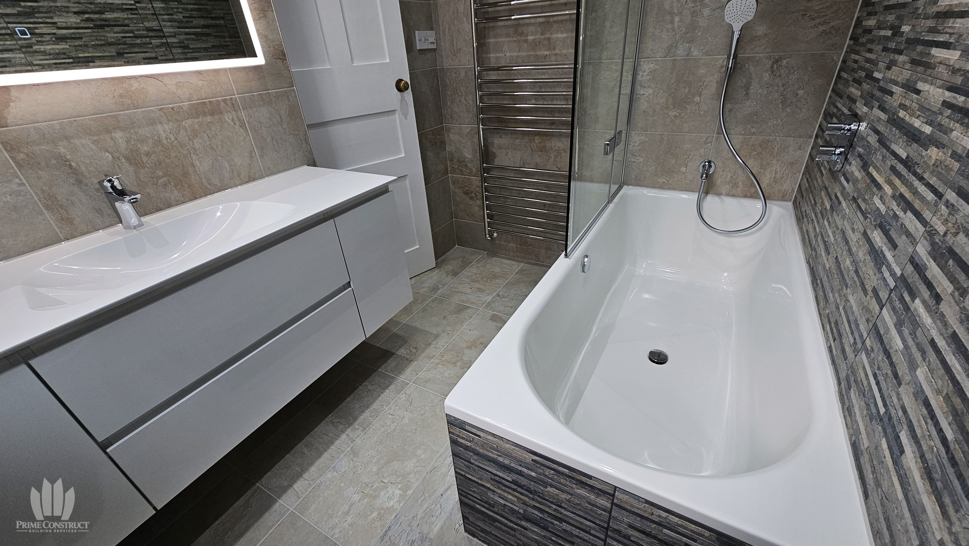Bath, glazed screen and floating vanity