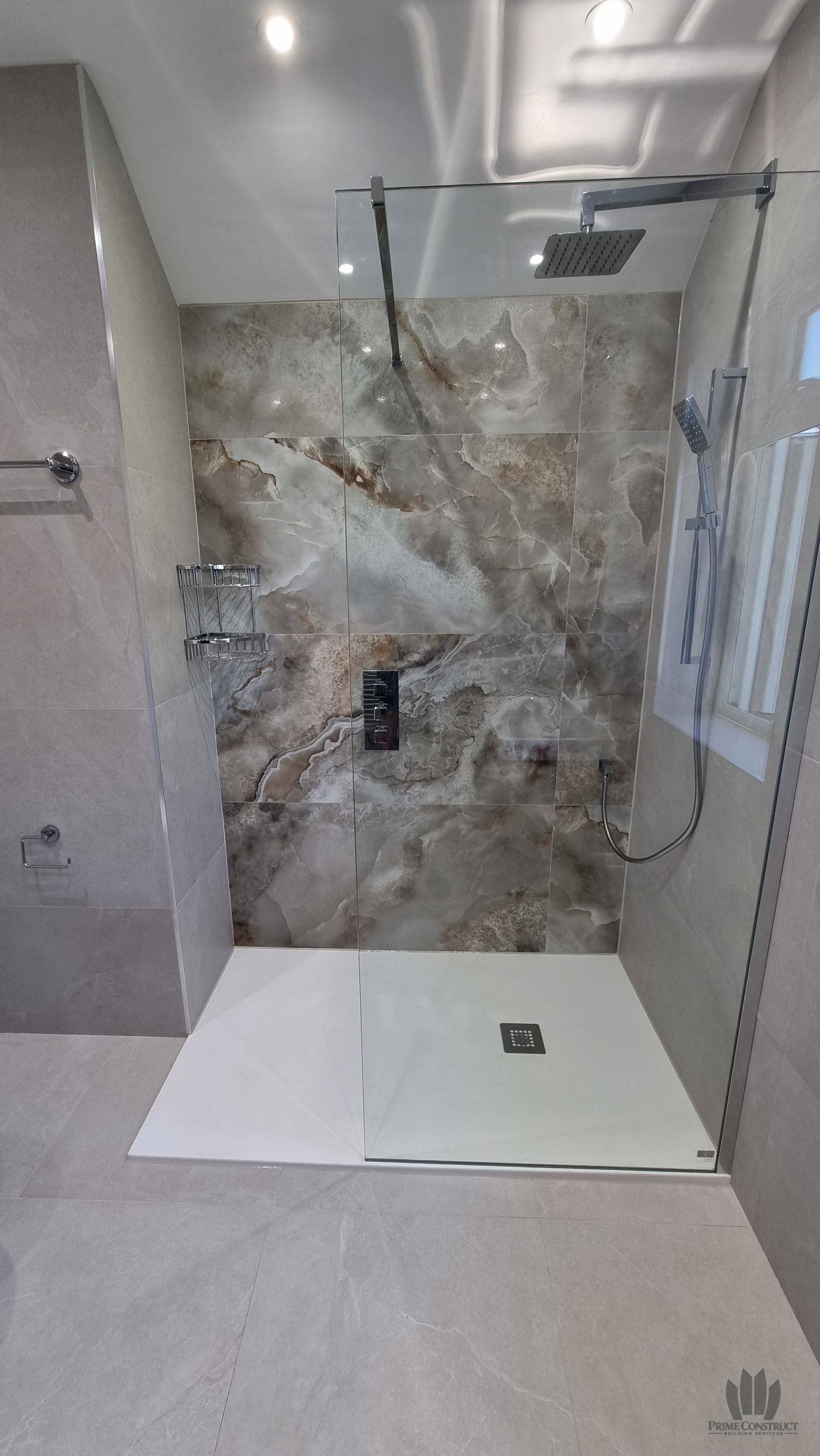 Completed shower, screen, tray, mixer and feature tiles