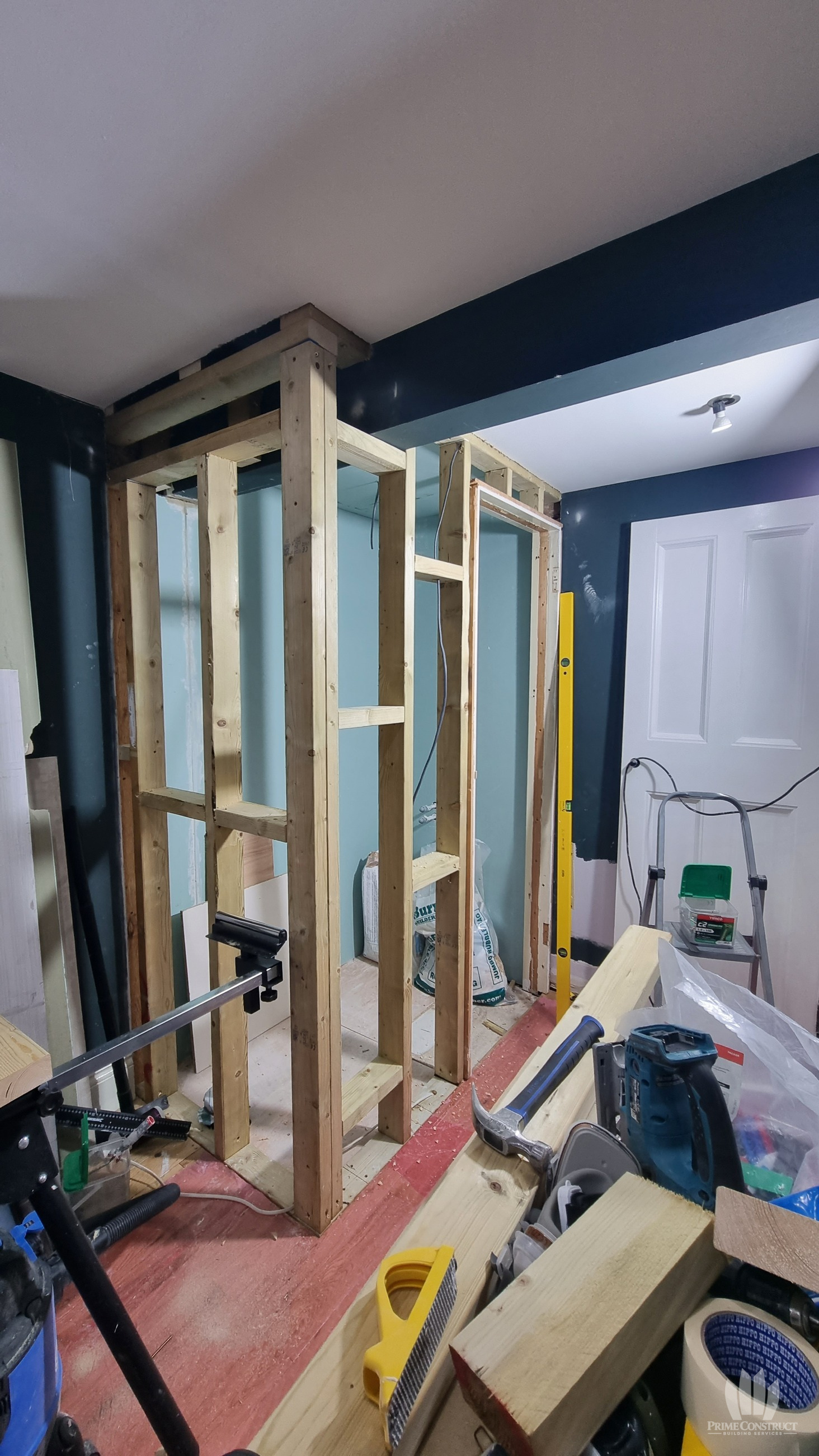 Timber enclosure frame formed within the bedroom