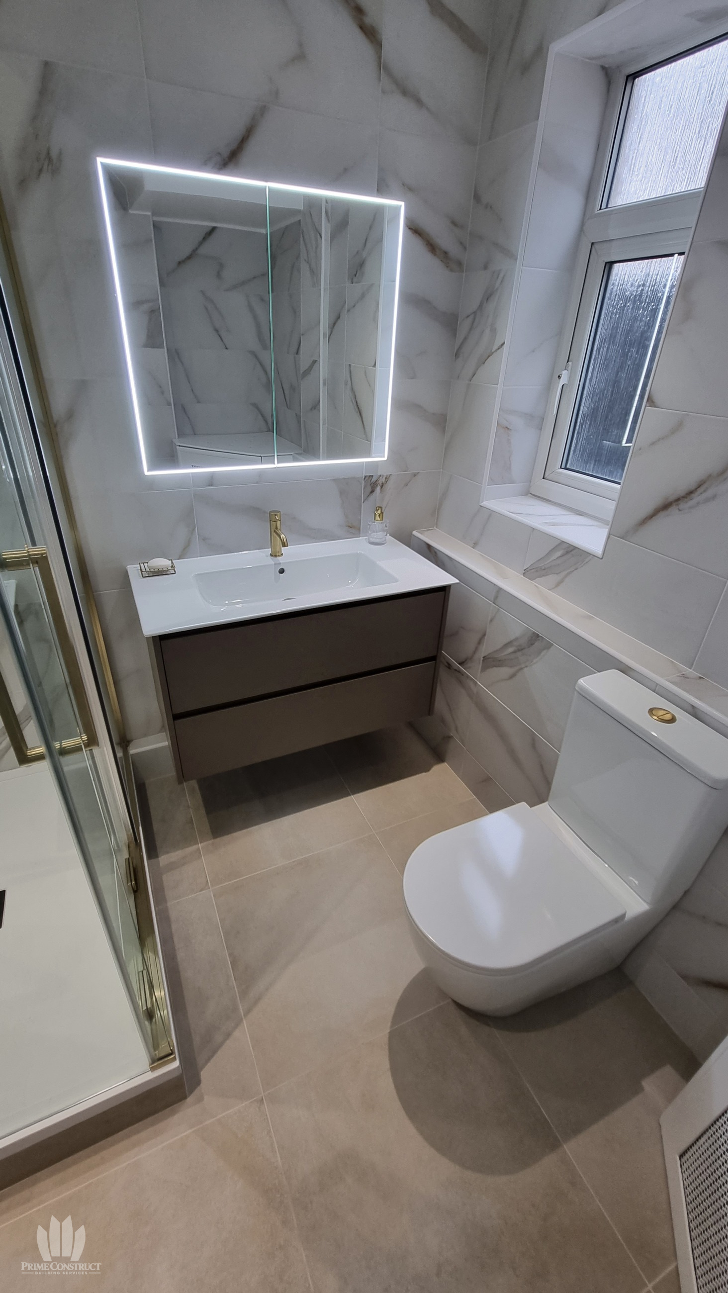 Finished vanity, illuminated mirror, window, WC and floor. Strong supporting layout view